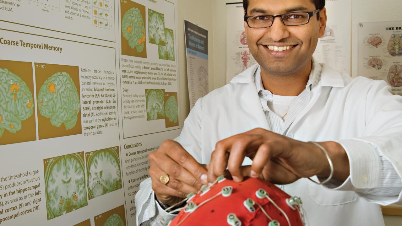 Professor Charan Ranganath is a member of the band Here Knows When, which is comprised of UC Davis researchers and a UC Davis alum. Karin Higgins/UC Davis Charan Ranganath uses an EEG cap.